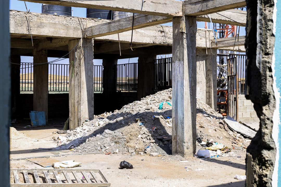 Construction site managed by BMCCA LINK with scaffolding and workers